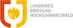 Wappen des Landkreises: rot-gelb mit Adler