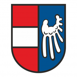 Endinger Wappen: links Österreicher Wappen, rechts weißer Flügel auf blauem Grund
